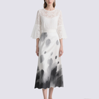 Chic White Lace Blouse with Ink Blot Midi Skirt Set