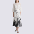 Chic White Lace Blouse with Ink Blot Midi Skirt Set
