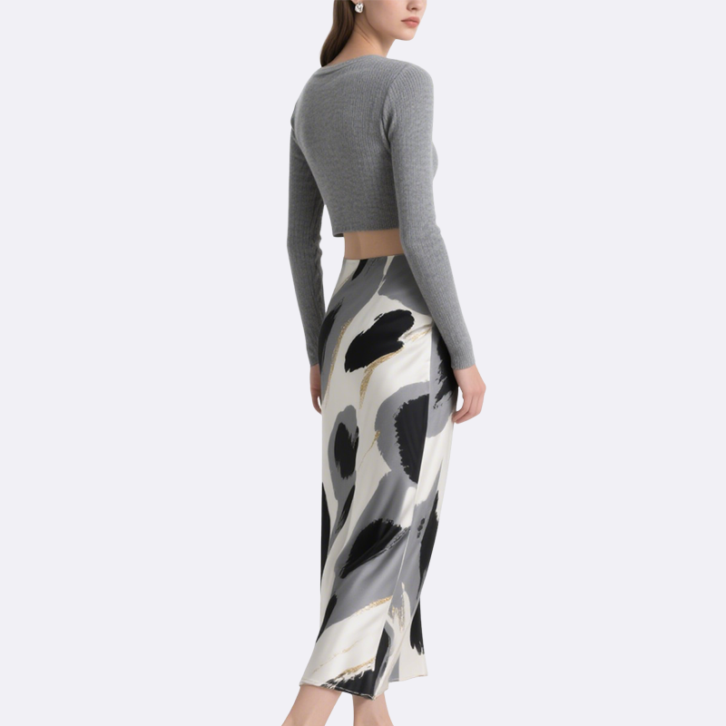 Elegant Bow Crop Top & Abstract Art Skirt Set