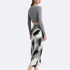 Elegant Bow Crop Top & Abstract Art Skirt Set