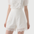 Chic White Floral Lace Mock Neck Blouse with Shorts Set